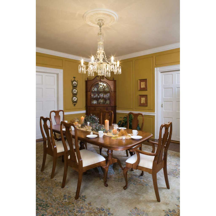 Formal dining room with a cherry Queen Anne extension table, six upholstered chairs and a corner china cabinet