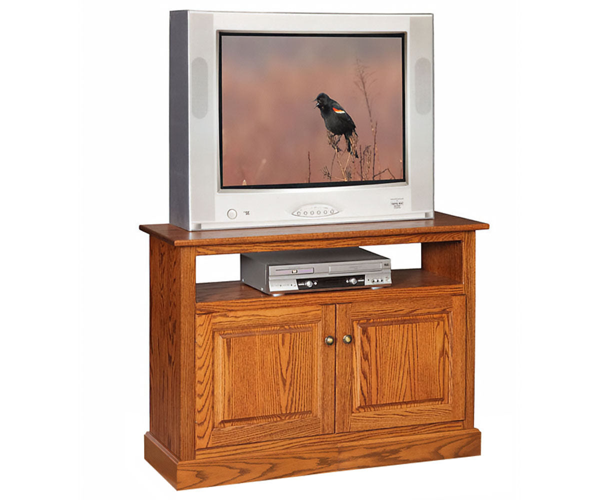 Wooden TV stand with a television displaying a bird on a white background