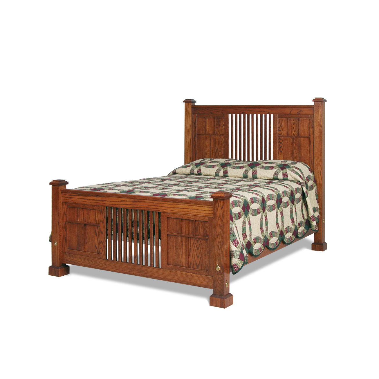 Mission style oak panel bed with vertical slat head and footboard and a wedding ring quilt