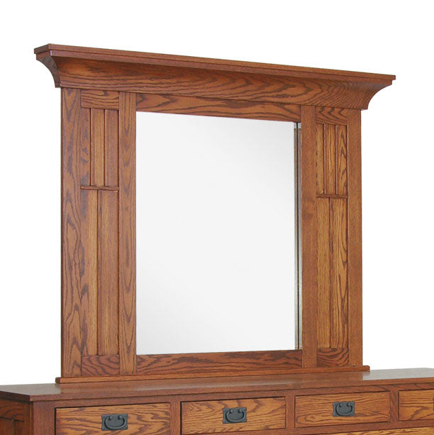 Landscape Mission mirror in oak with a flared crown top and slatted side panels, mounted above a dresser