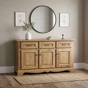 Natural oak sideboard buffet with three drawers over three raised panel doors and a scalloped base under a round mirror