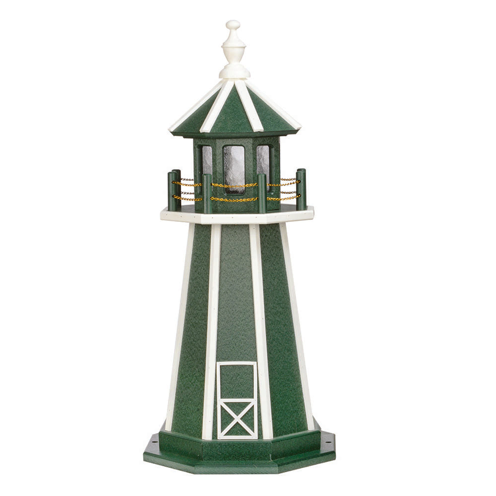 Dark green wooden lighthouse with white corner stripes and door, white railing and finial, green lantern room