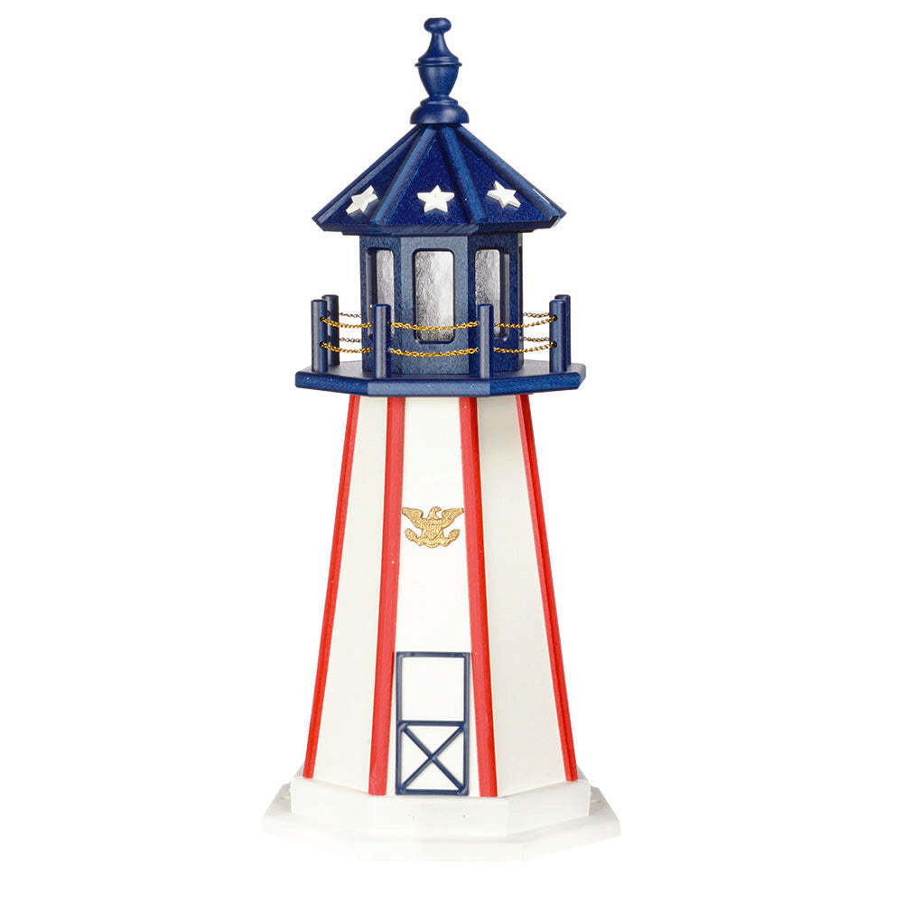 White lighthouse with narrow red corner stripes, gold eagle emblem, blue lantern room with white stars and finial
