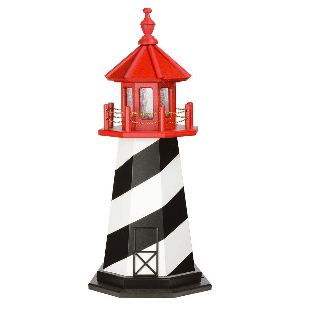 Black and white spiral striped lighthouse topped with a bright red lantern room and finial, on a black base