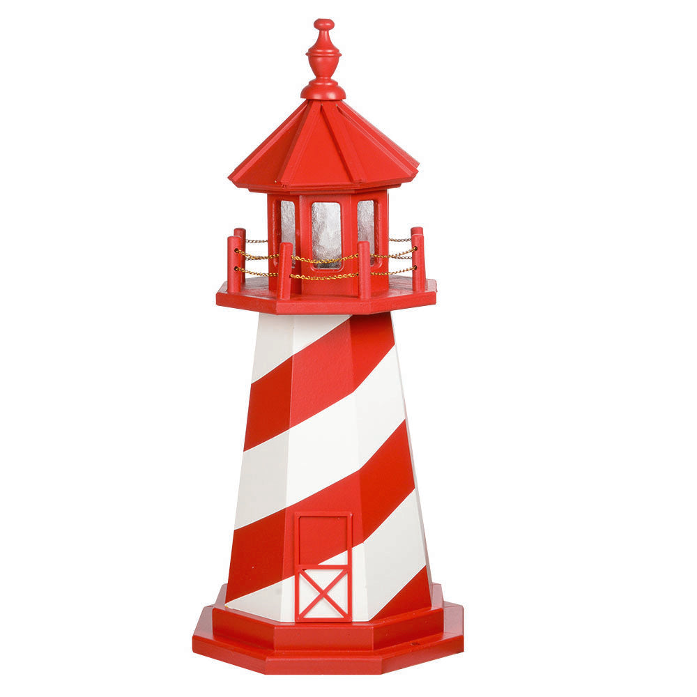 Red and white spiral striped lighthouse with a red lantern room, gold chain railing and matching red base