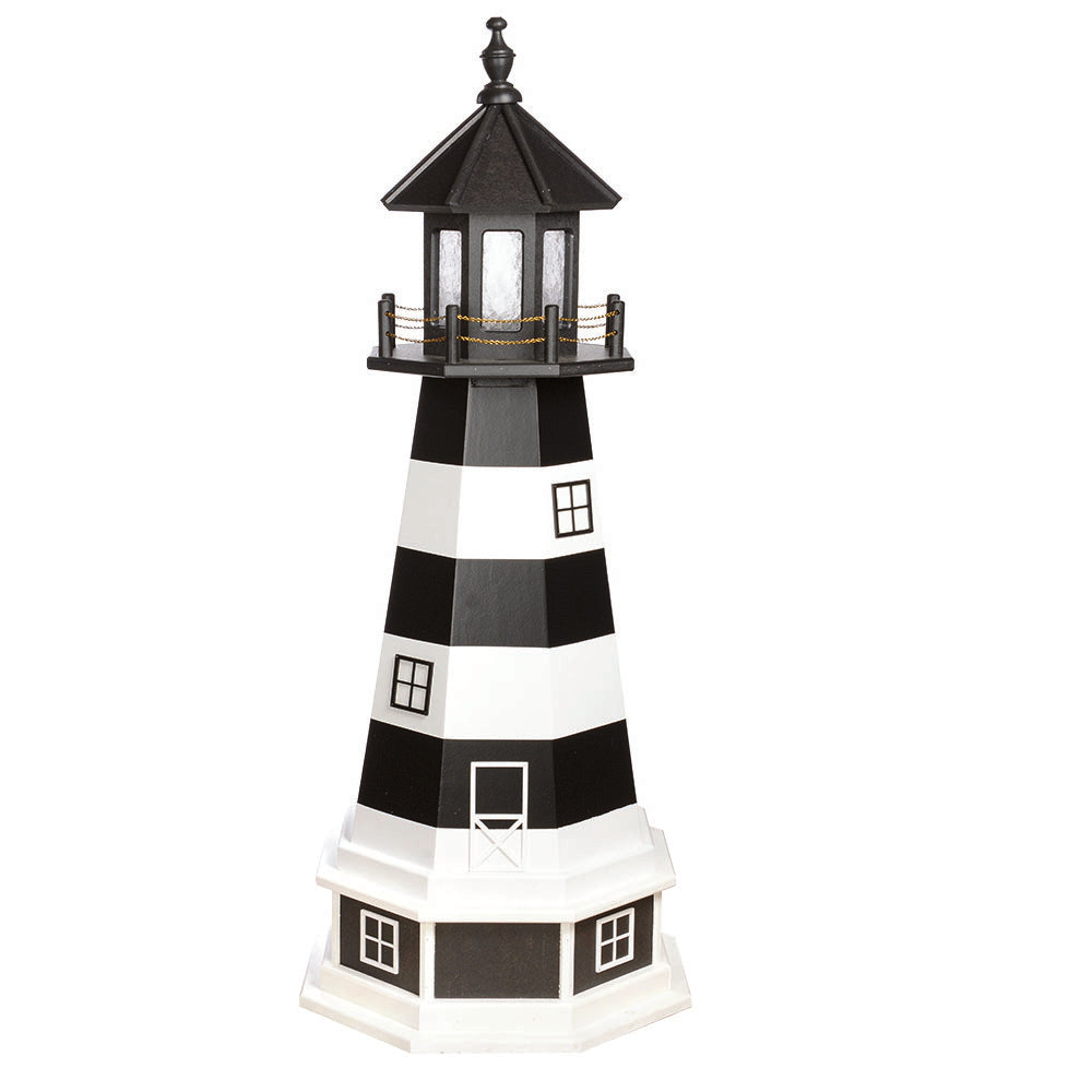 Black and white banded lighthouse with black lantern room, standing on a white base with black window panels