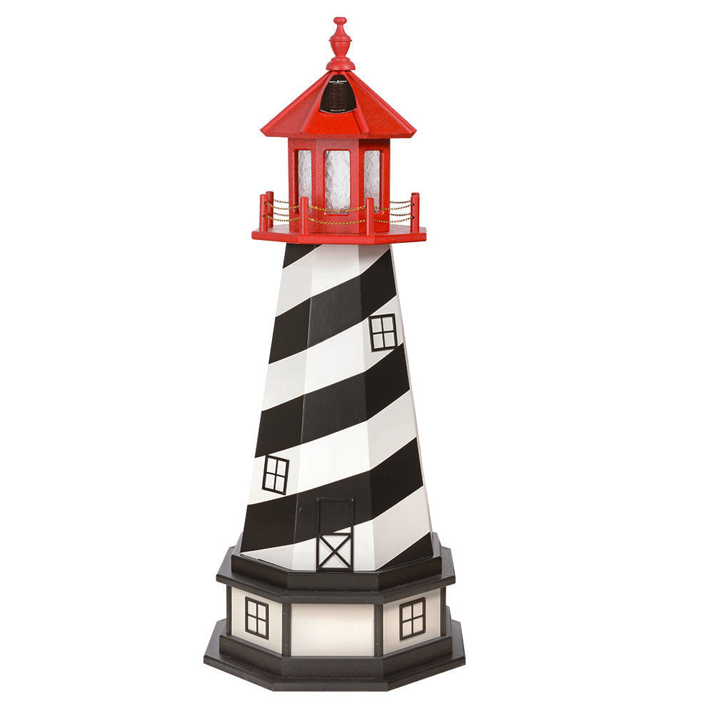 Black and white spiral striped lighthouse topped with a red lantern room, standing on a black and ivory base