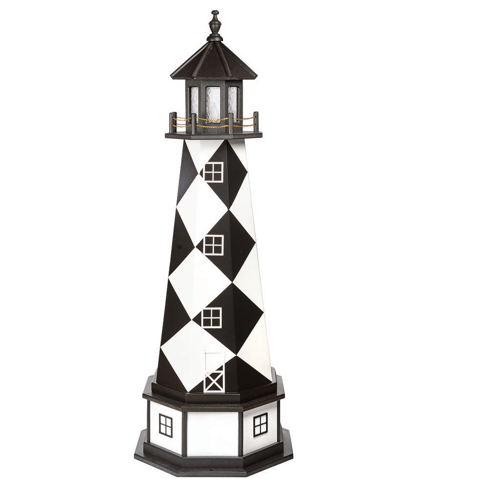 Black and white diamond patterned lighthouse with black lantern room and a white paneled base with black trim