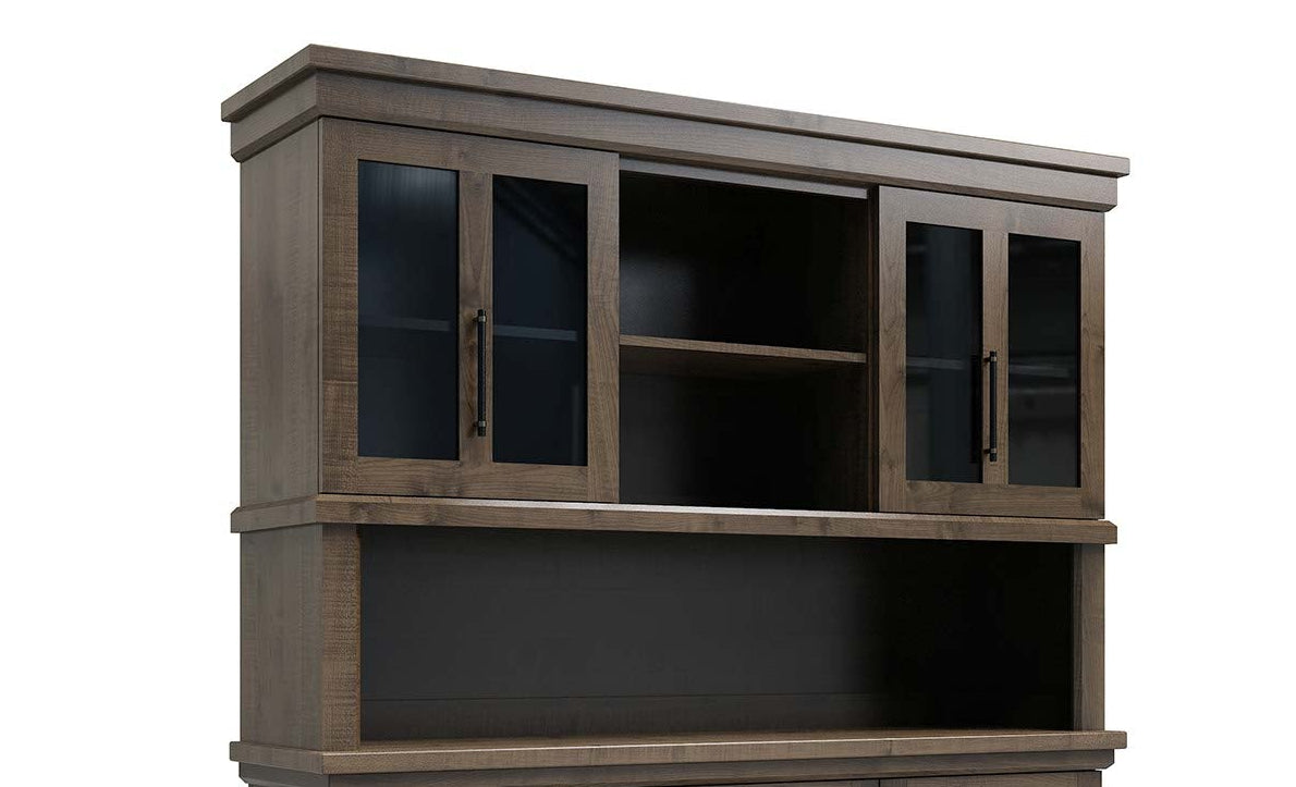 Close view of a hutch top with two glass doors, open center shelving and a dark interior in gray wood