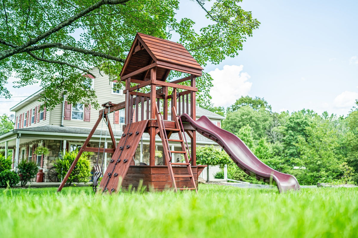 4x4 Challenger Wooden Swing Set & Playset Kit – real-world photo (configuration and colors may differ from the layouts offered)