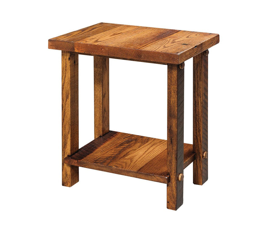 Rustic reclaimed oak end table with chunky pegged legs, a plank top and open bottom shelf on white