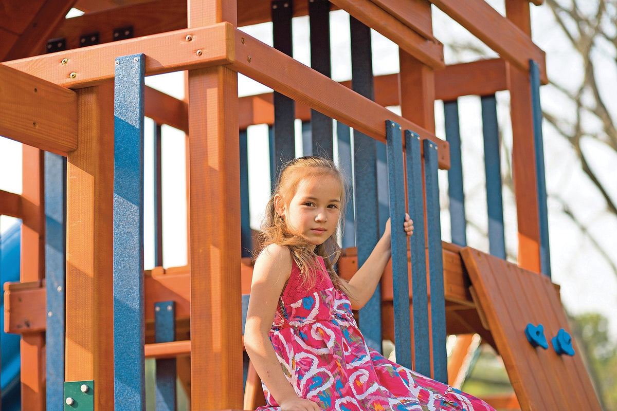 Castle Wooden Swing Set & Playset Kit – real-world photo (configuration and colors may differ from the layouts offered)
