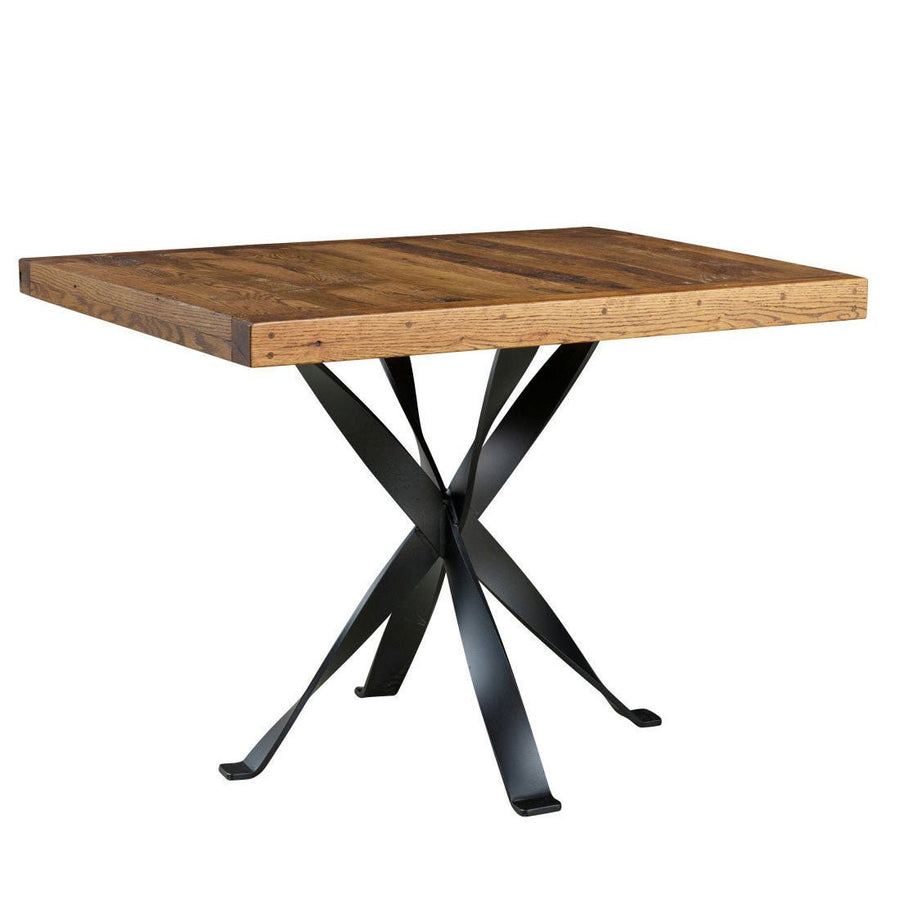 Square rustic counter table with a warm stained reclaimed top and crossed black metal legs with flat feet