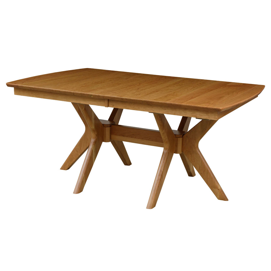 Natural oak rectangular pedestal dining table with a leaf seam and angled crossed trestle legs on white