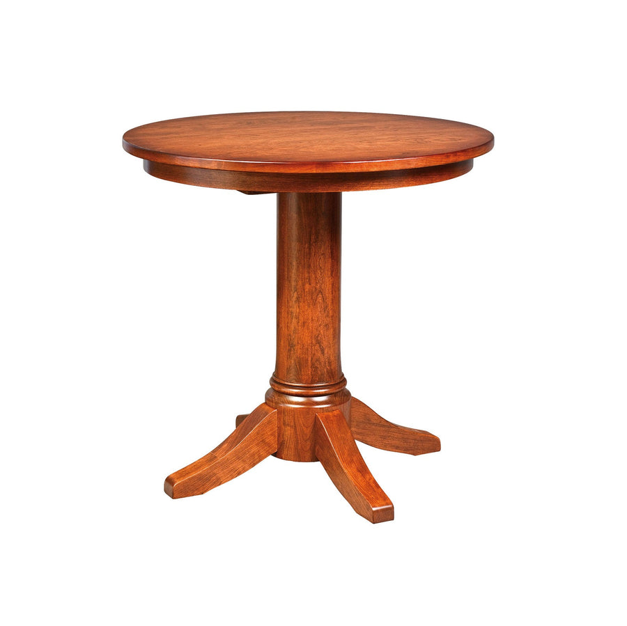 Round counter height pedestal table in cherry with a turned column base and four shaped splayed feet