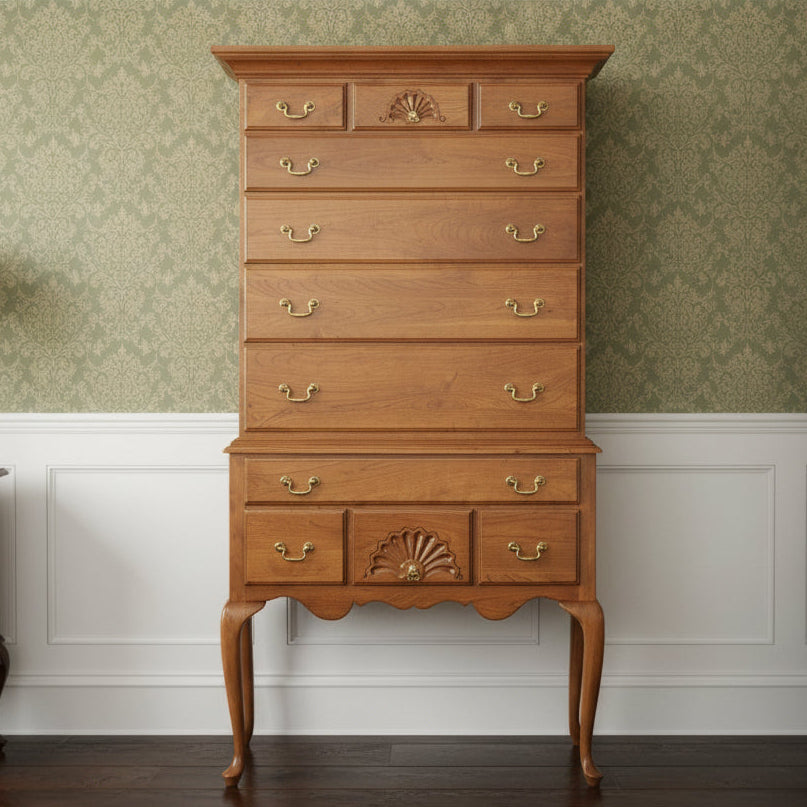 Wooden dresser with multiple drawers on a white background