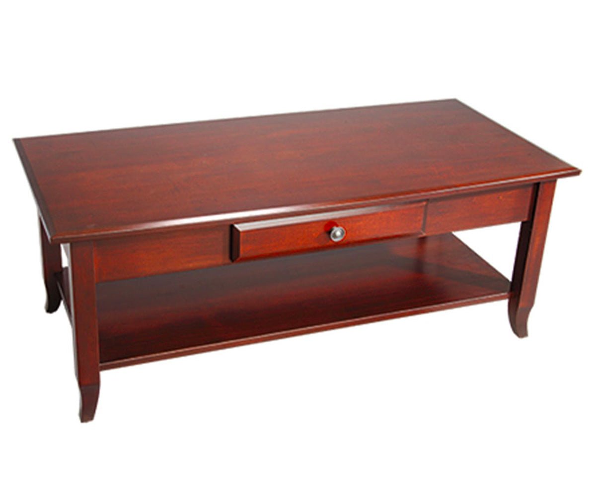 Cherry coffee table with a center drawer, nickel knob, lower shelf and gently flared legs on a white background