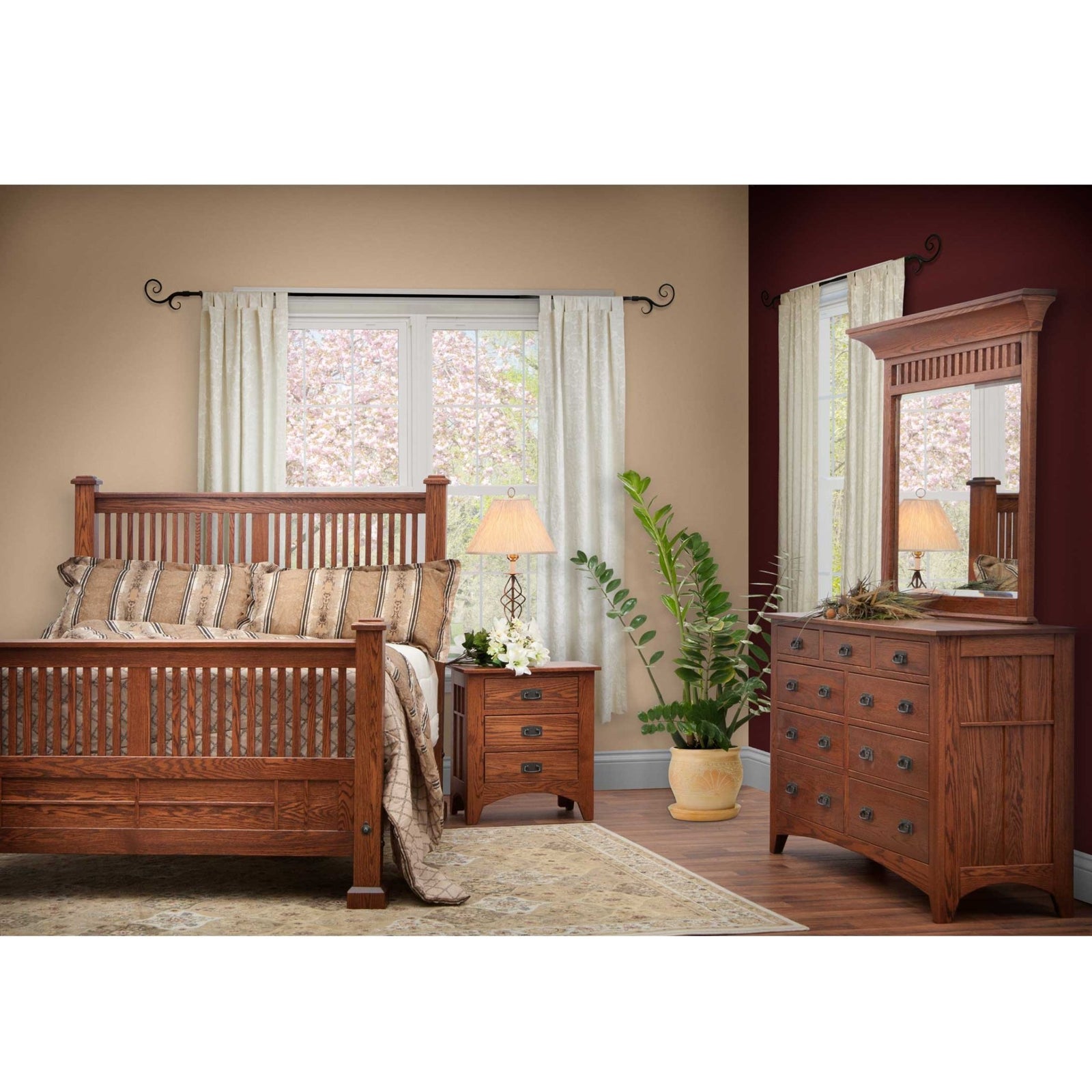 Mission oak bedroom set with slatted bed, matching nightstand and mirrored dresser in a warm styled bedroom