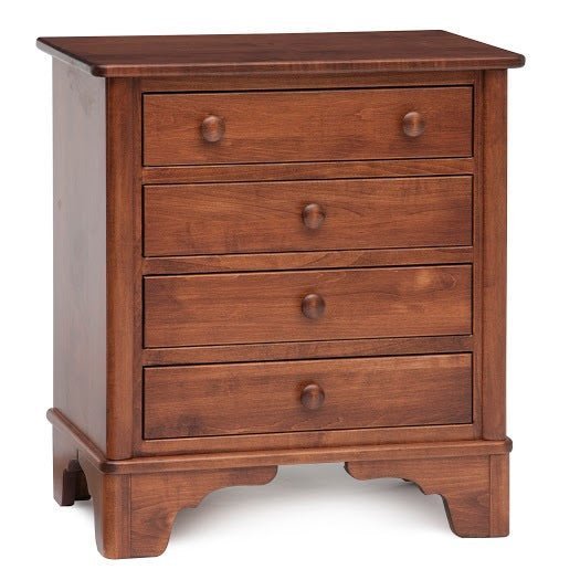 Four-drawer cherry nightstand with round wood knobs and a scalloped bracket base on a white background