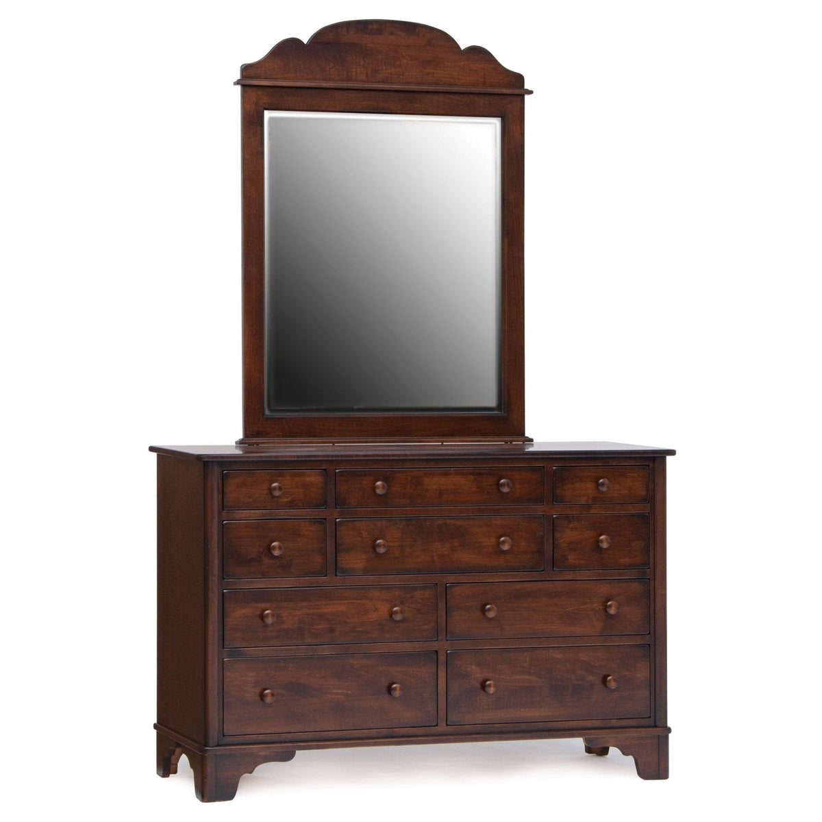 New Amsterdam scroll mirror on a ten-drawer cherry dresser with round wood knobs