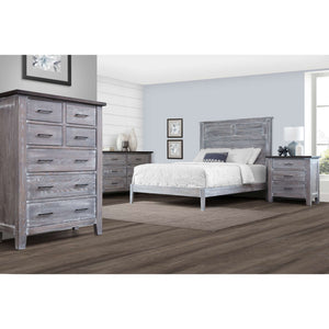 Gray weathered oak bedroom set styled in a light bedroom with louvered panel queen bed, six drawer dresser, tall chest and nightstand