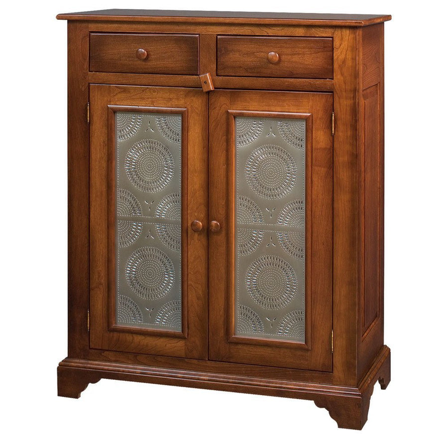 Cherry pie safe cupboard with two punched tin door panels in a circular pattern, two drawers and a bracket foot base