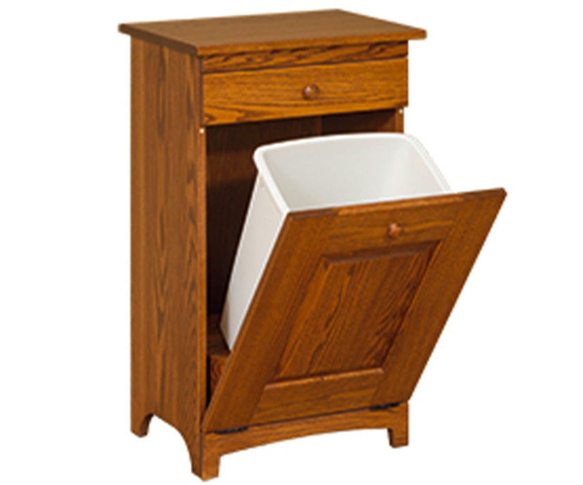 Oak trash bin shown with the door tilted open to reveal the white waste container, with a storage drawer above