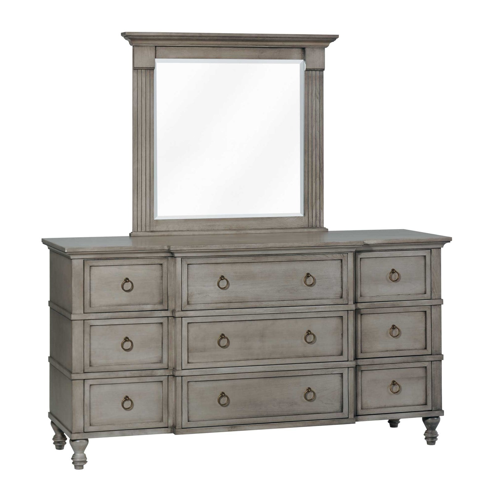 Gray nine-drawer dresser with framed mirror styled with candles beside a tall chest and upholstered bench