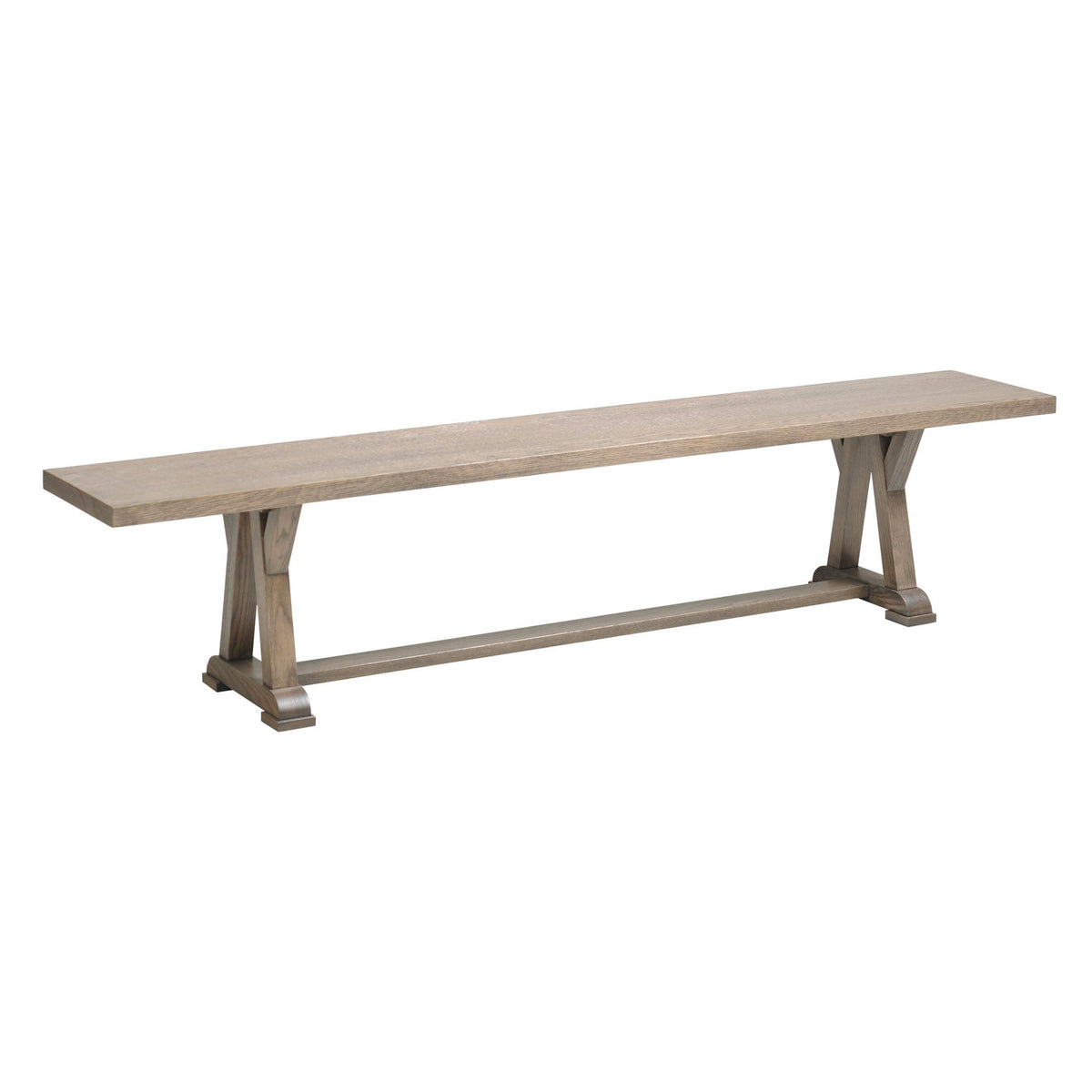 Driftwood gray trestle bench with a wide plank seat, X-form legs and a long stretcher rail on white