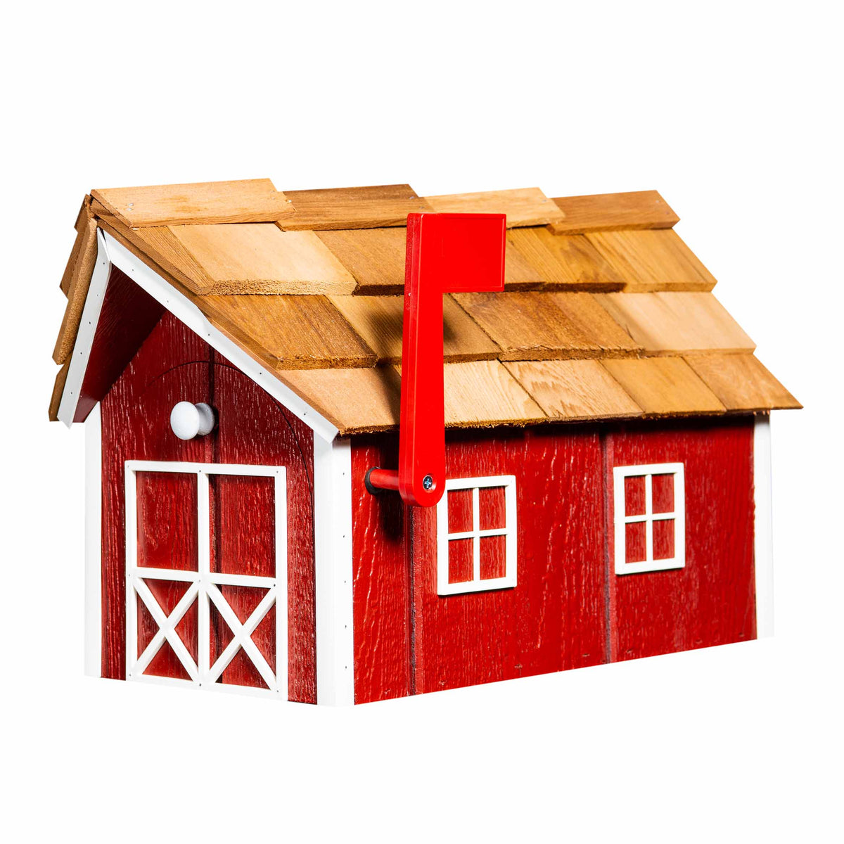 Bright red wood barn mailbox with white cross-braced doors, white window trim and cedar shingle roof