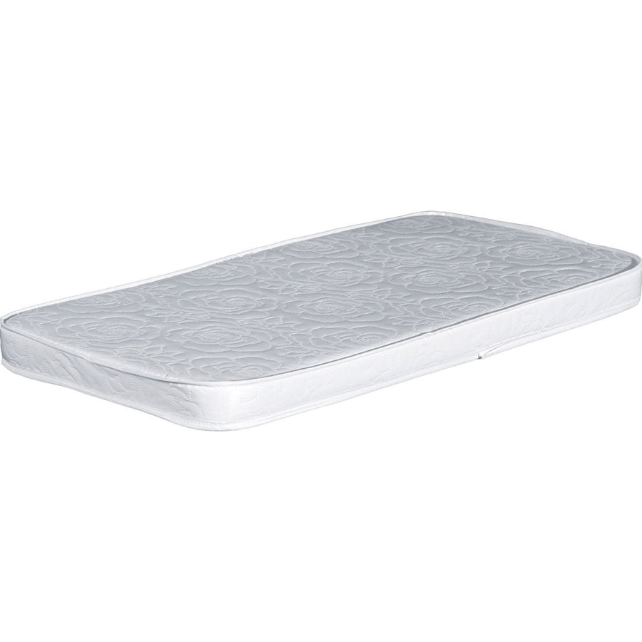 Quilted white crib changing pad with rounded corners and a waterproof damask patterned cover