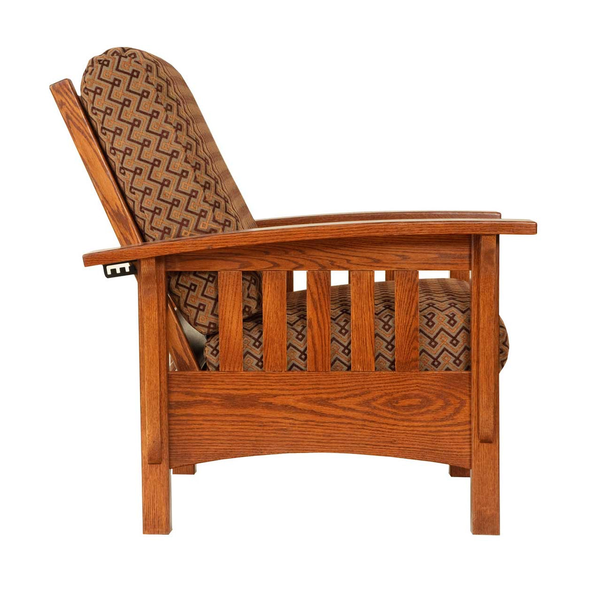 Profile of a mission Morris chair in geometric fabric with reclining back, oak slats and arched side skirt