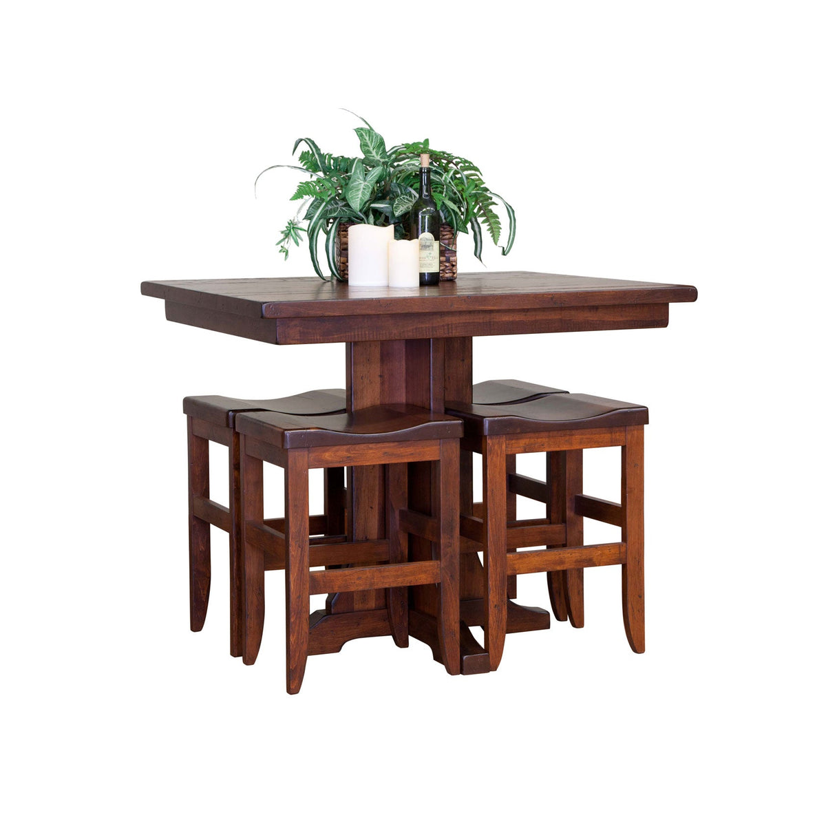 Rustic cherry counter height pedestal table with four saddle seat bar stools tucked underneath on white