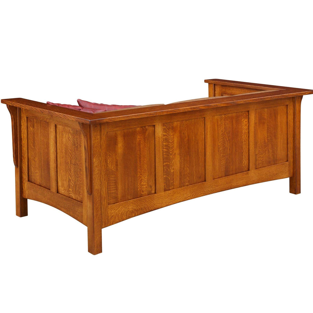 Back view of an oak club sofa showing flat panel back, curved arm returns and arched lower rail