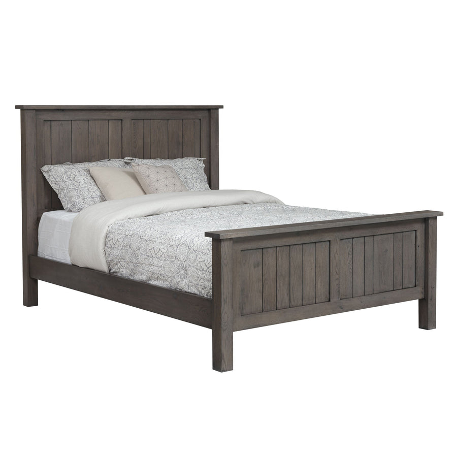 Weathered gray oak panel bed shown at an angle with white bedding, plank headboard and matching footboard