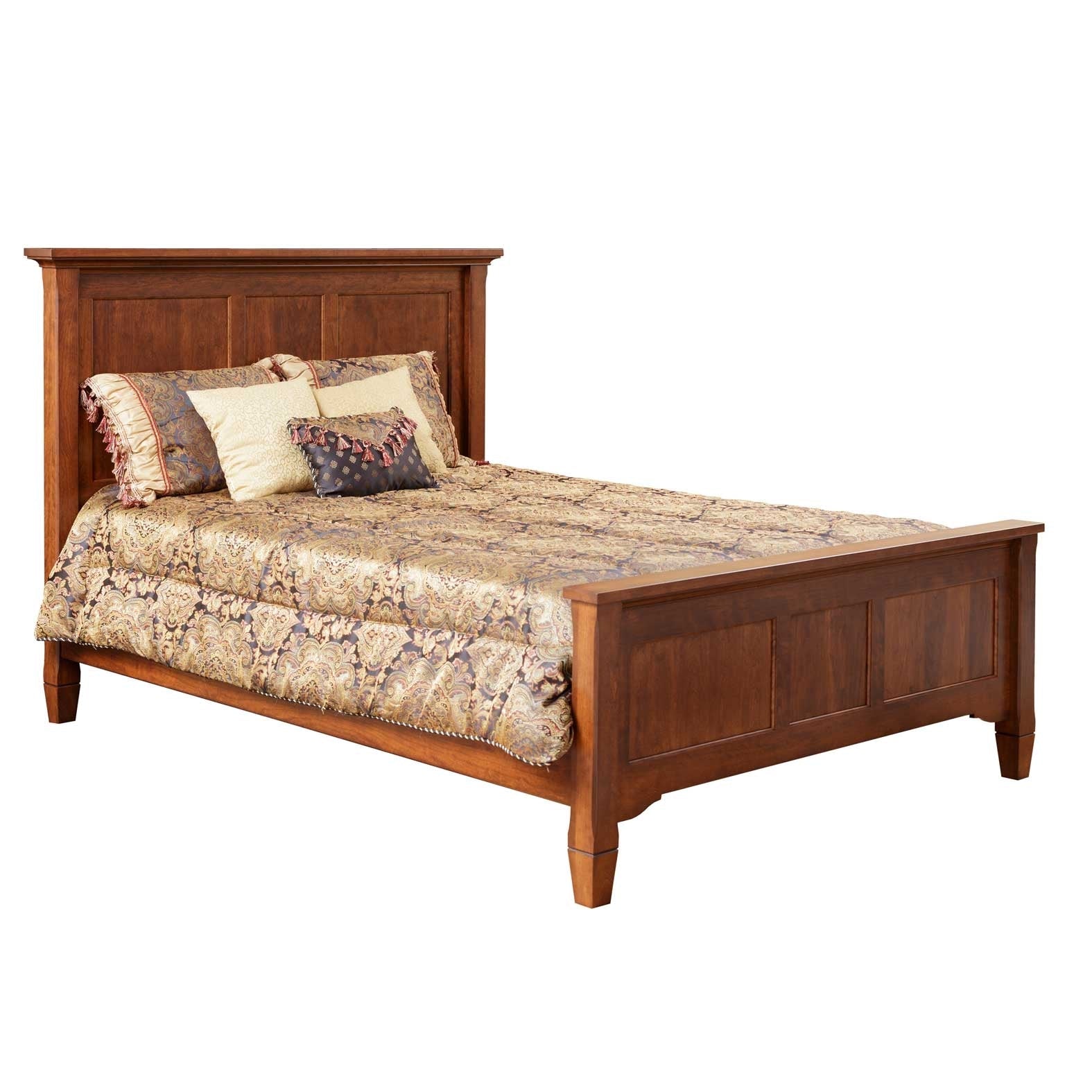 Dark cherry panel bed with nightstand and lamp in a bedroom with brown paisley bedding and sheer curtains