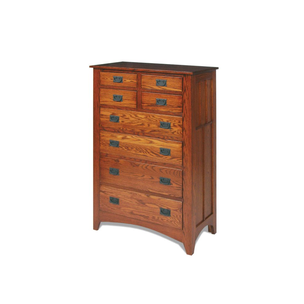 Mission style oak chest of eight drawers with slatted paneled sides, dark bail pulls and an arched base