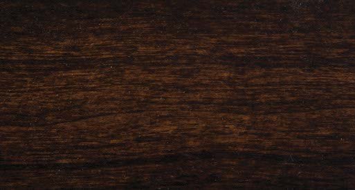 Onyx stain on cherry sample, a nearly black dark brown finish with faint grain showing through