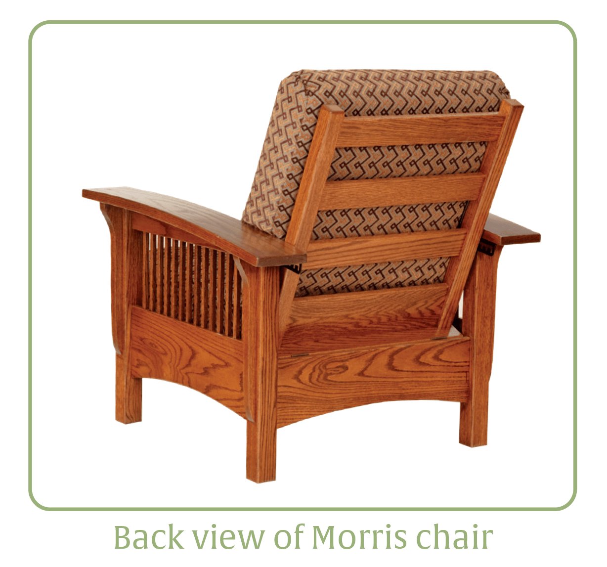 Oak paneled Morris chair with floral tapestry cushions and a matching brown leather ottoman