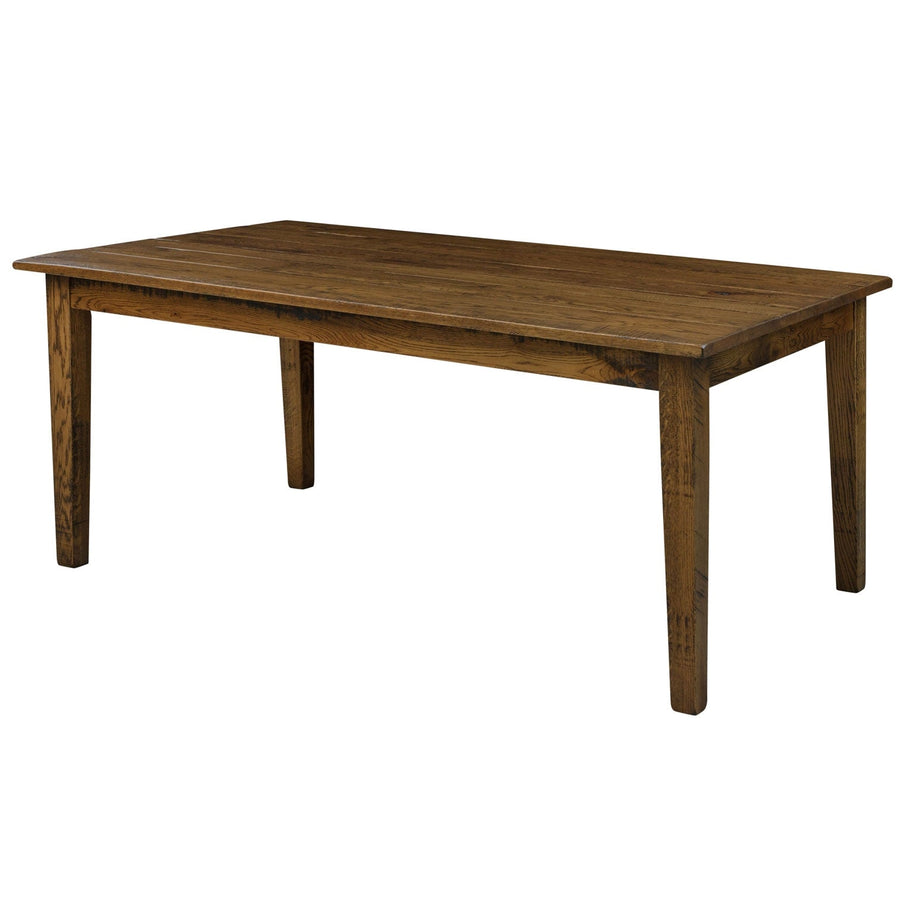 Rectangular farmhouse leg dining table in rustic oak with a plank top, breadboard ends and tapered square legs on white
