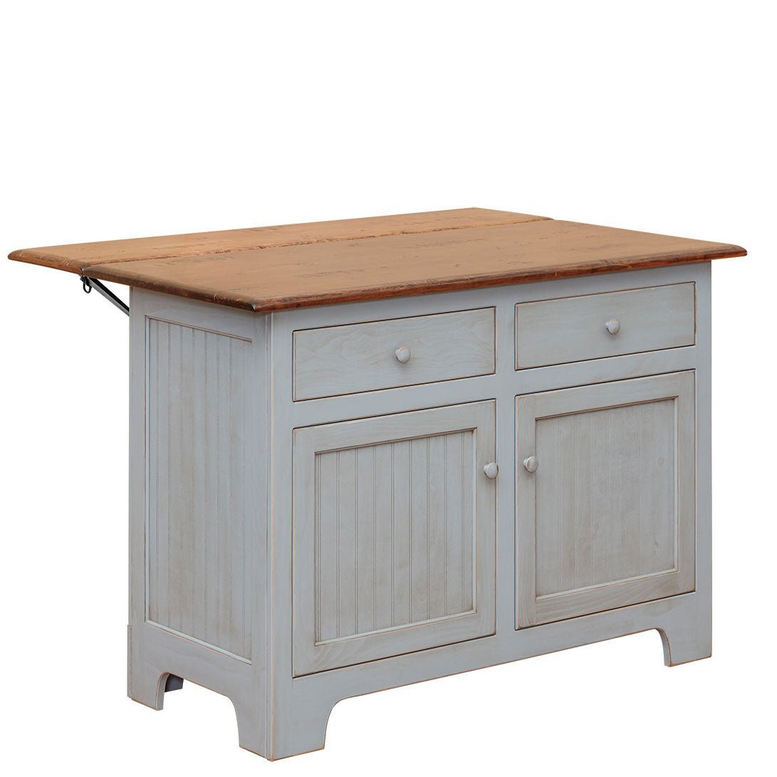 Gray blue painted kitchen island with a pine plank top, raised drop leaf, two drawers and beadboard doors