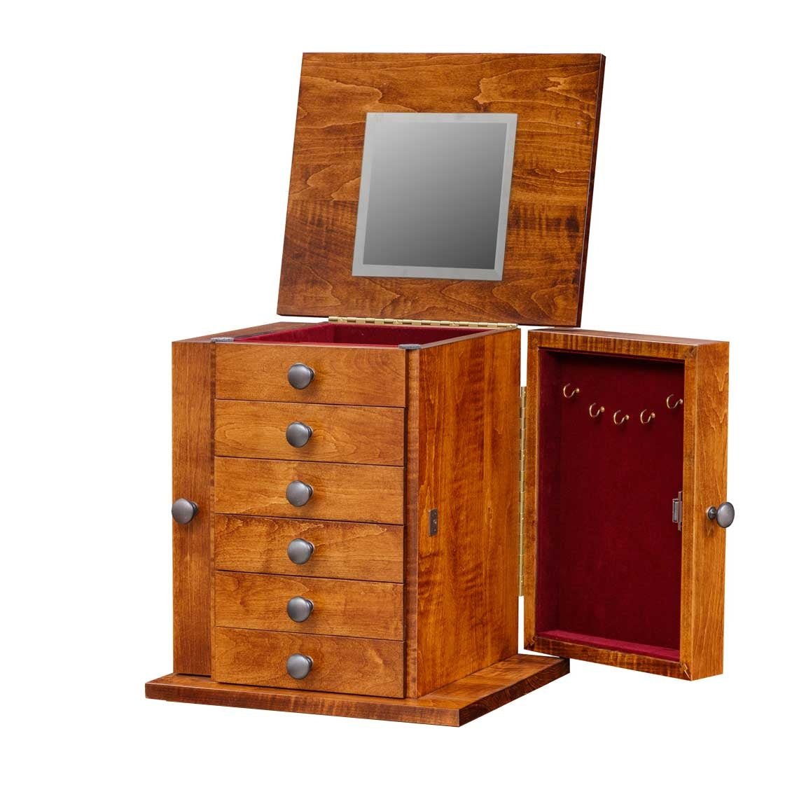 Jewelry chest shown open with a mirrored lift lid, red velvet lined interior and swing out necklace door