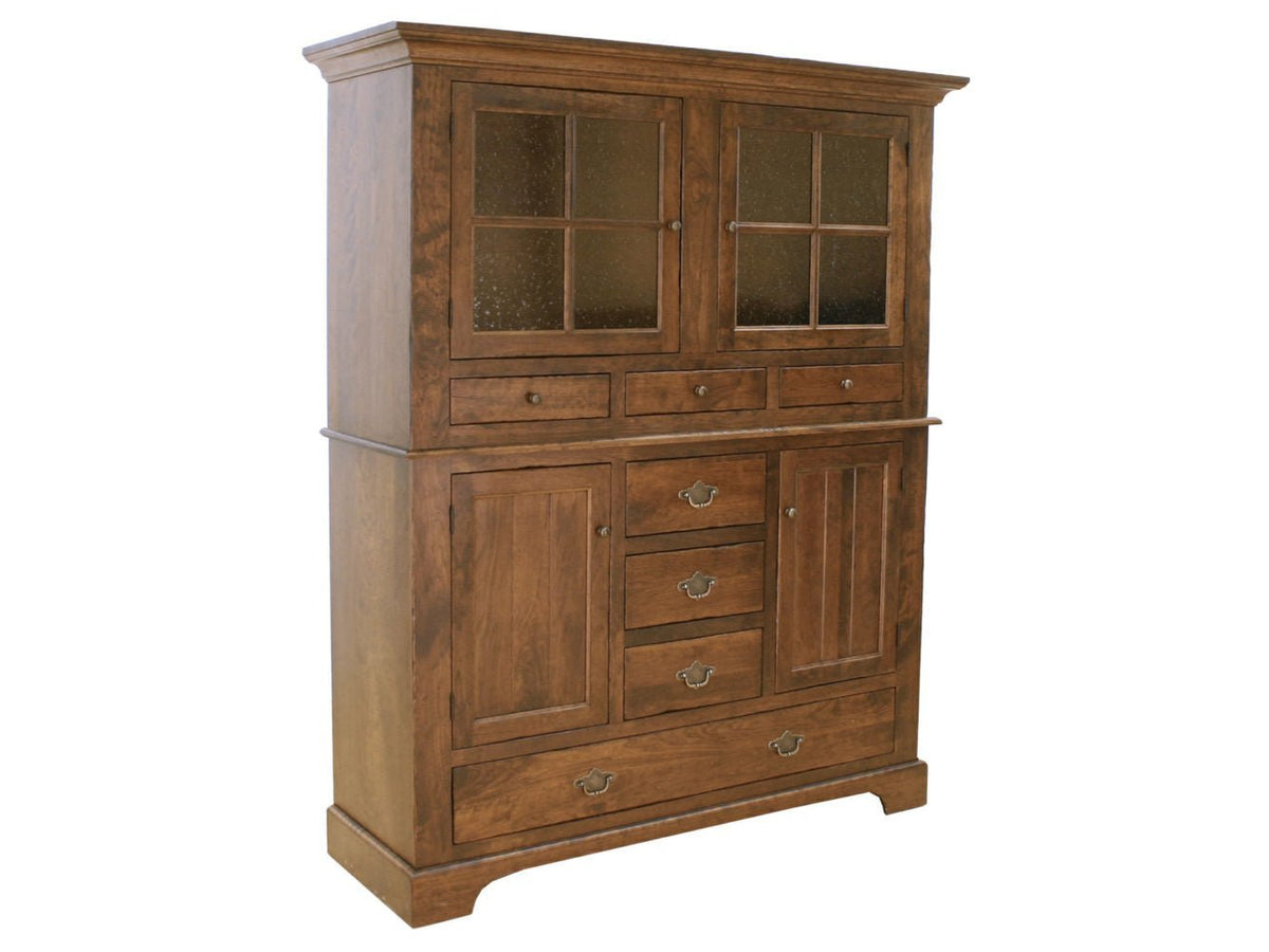 China cabinet with glass doors above and a wide bottom leaf storage drawer, paneled doors and brass bail pulls