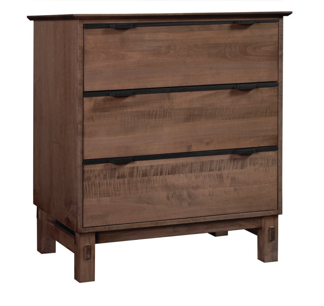 Three drawer chest in figured brown maple with slim black bar pulls and a rustic peg through leg base