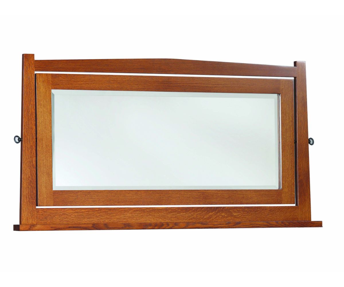Quartersawn oak dresser mirror with arched crest rail, beveled glass and pivot posts on a white background