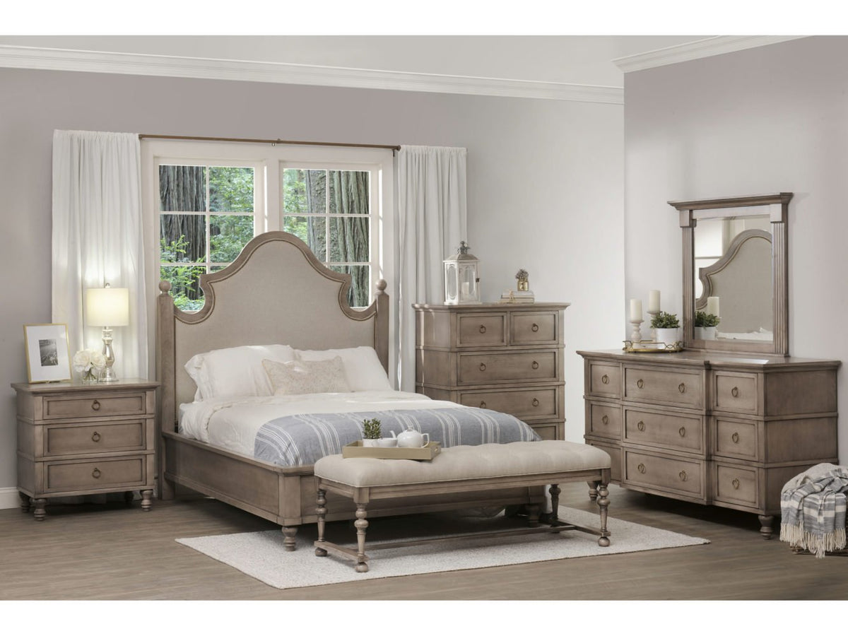 Panel bed styled in a taupe bedroom with tufted bench, chest of drawers, nightstand and mirrored dresser