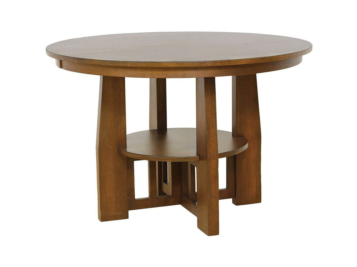 Round oak dining table on a mission cross base with cut-out slats and a round lower display shelf