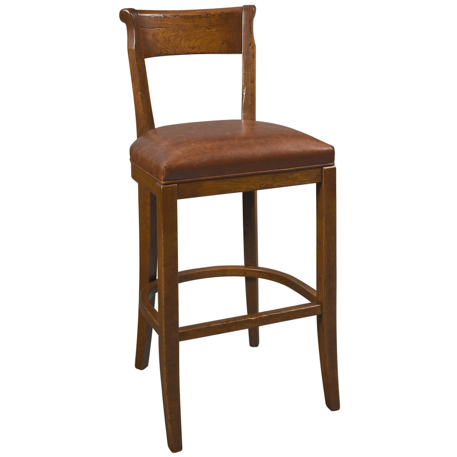 Bar height stool in cherry with a scrolled crest rail back, brown leather cushion seat and arched foot stretchers