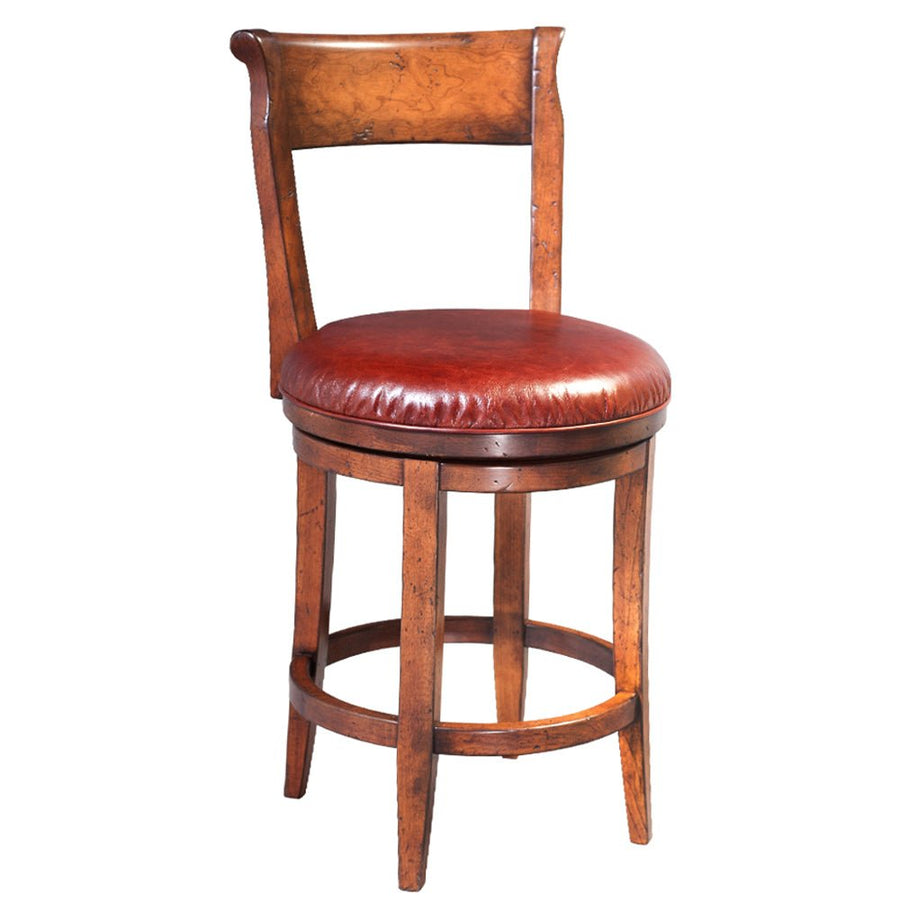 Swivel counter stool in warm cherry with a round red leather cushion seat, curved back and round foot ring