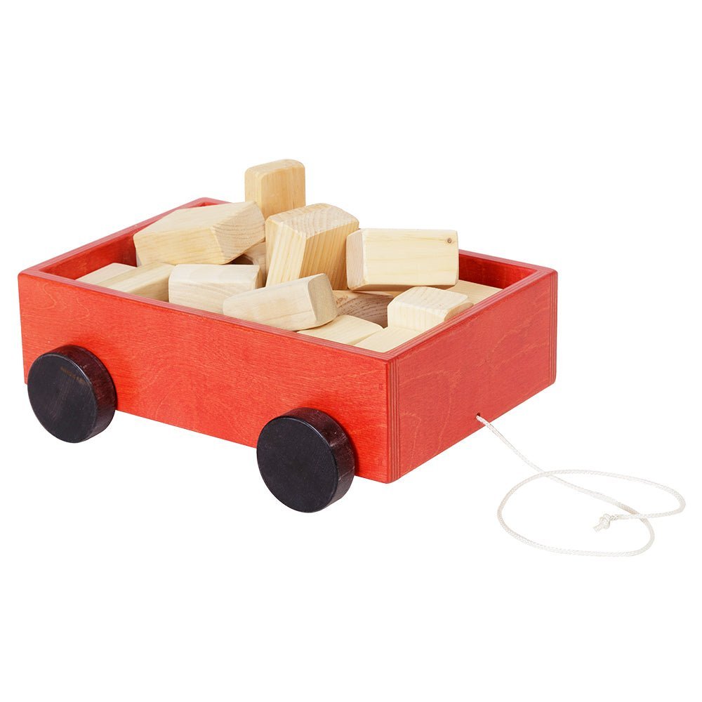 Red stained block wagon toy filled with chunky natural wood building blocks, black wheels and pull cord